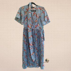 Plisse v décolletage, waist tie over the knee dress in floral pattern